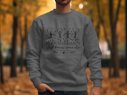 Gray sweatshirt with dancing skeletons and "Dry Bones Come Alive Ezekiel 37:5".