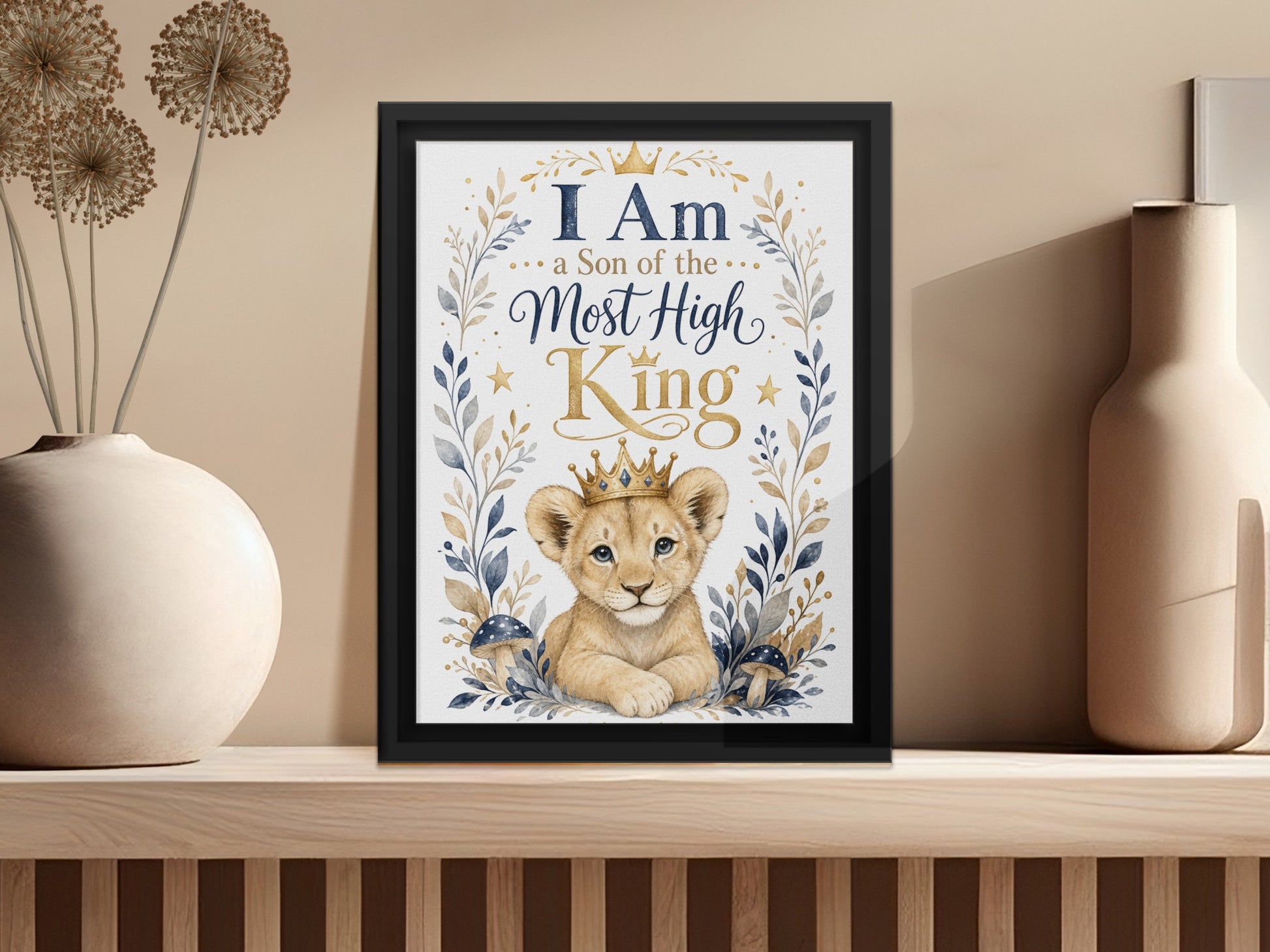 Framed artwork of a lion cub wearing a crown with text "I Am a Son of the Most High King".