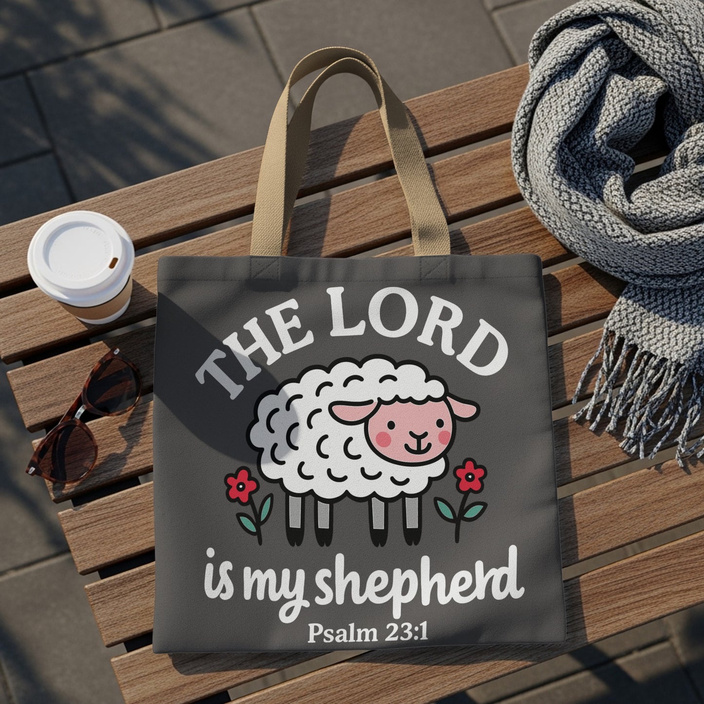 Dark gray tote bag with a cartoon sheep and text "THE LORD is my shepherd Psalm 23:1".