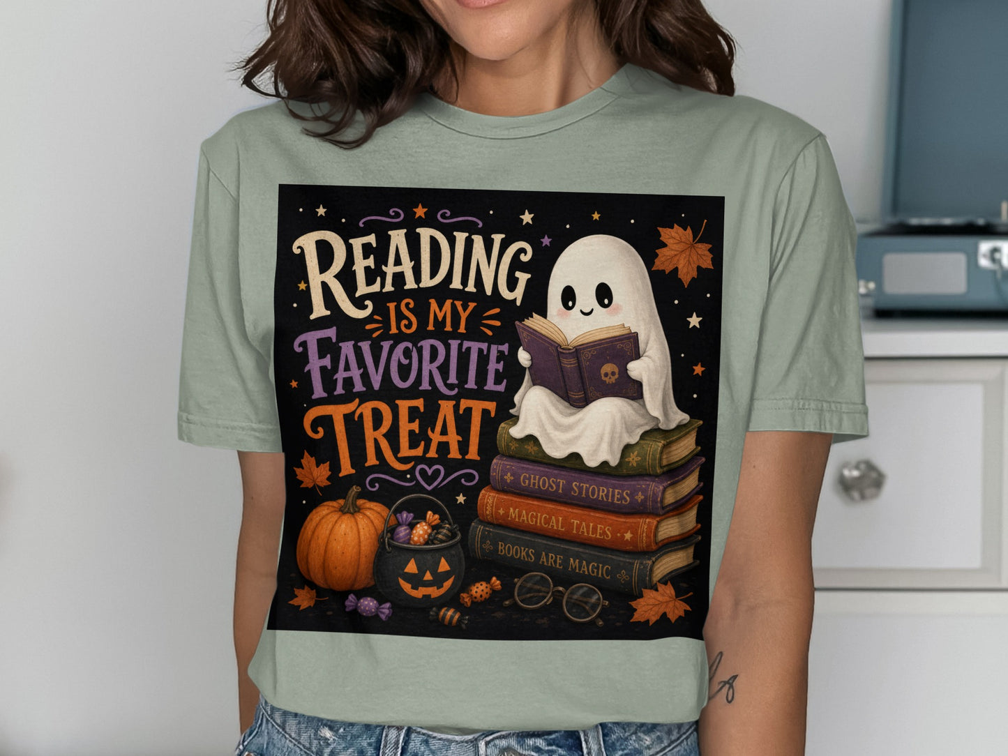 Cute ghost reading on stack of books with pumpkin, candy, and text "Reading is my favorite treat".