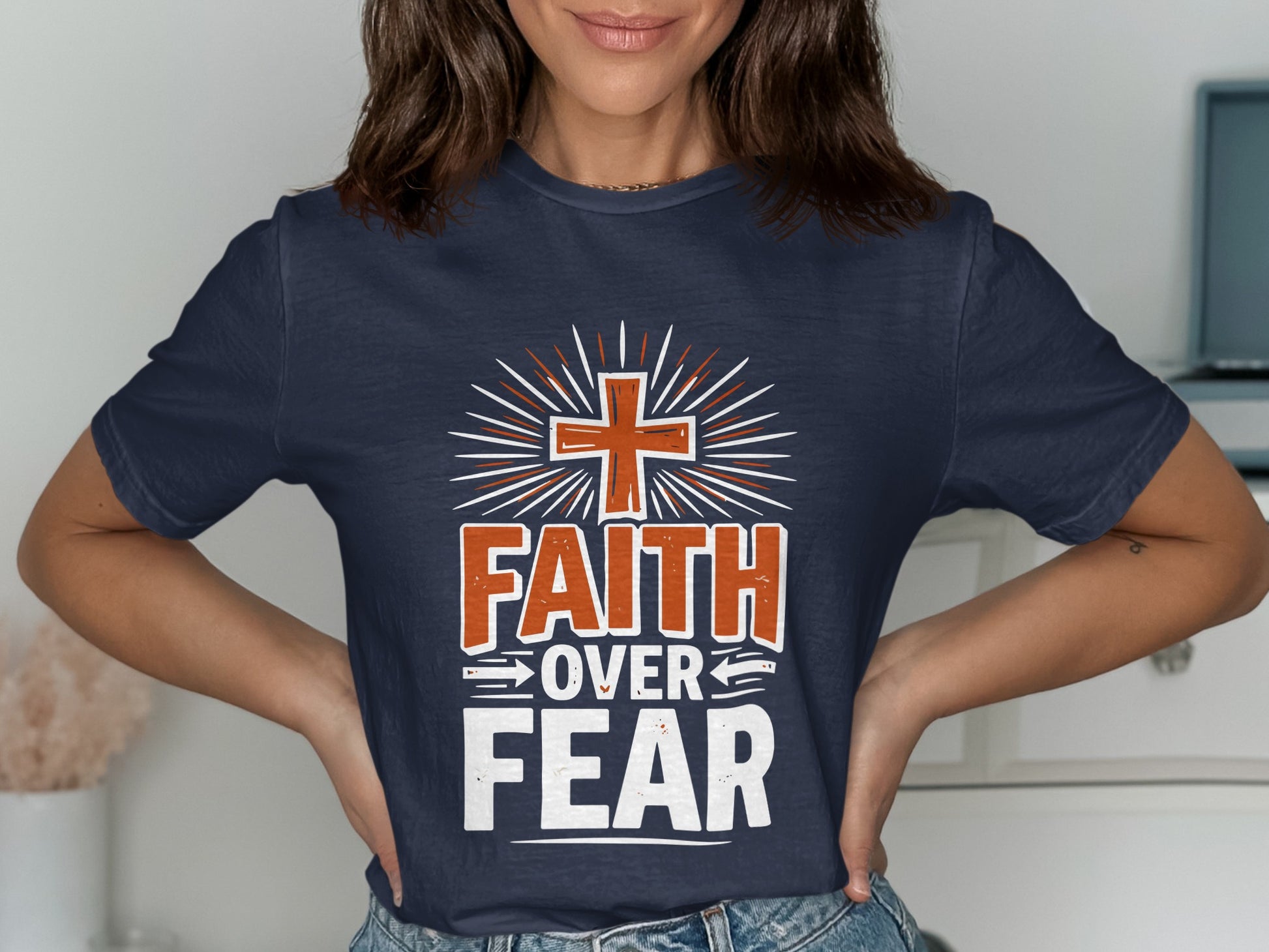 Navy t-shirt with "FAITH OVER FEAR" text and a cross symbol.