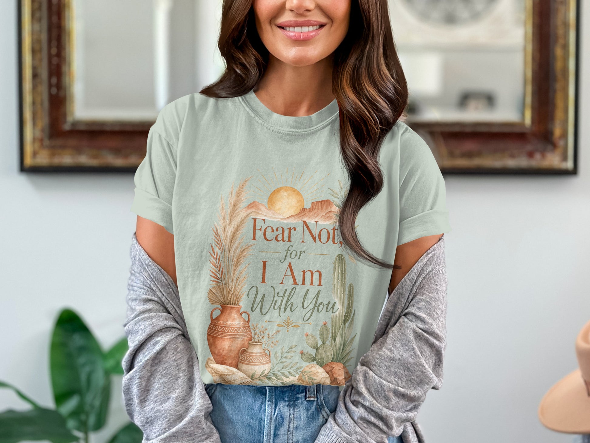 Light green t-shirt with desert sun, vases, and "Fear Not, for I Am With You" text.