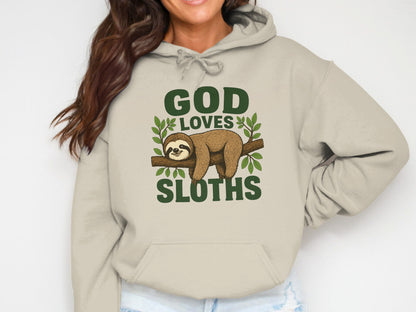 Beige hoodie with "GOD LOVES SLOTHS" graphic featuring a sloth on a branch.