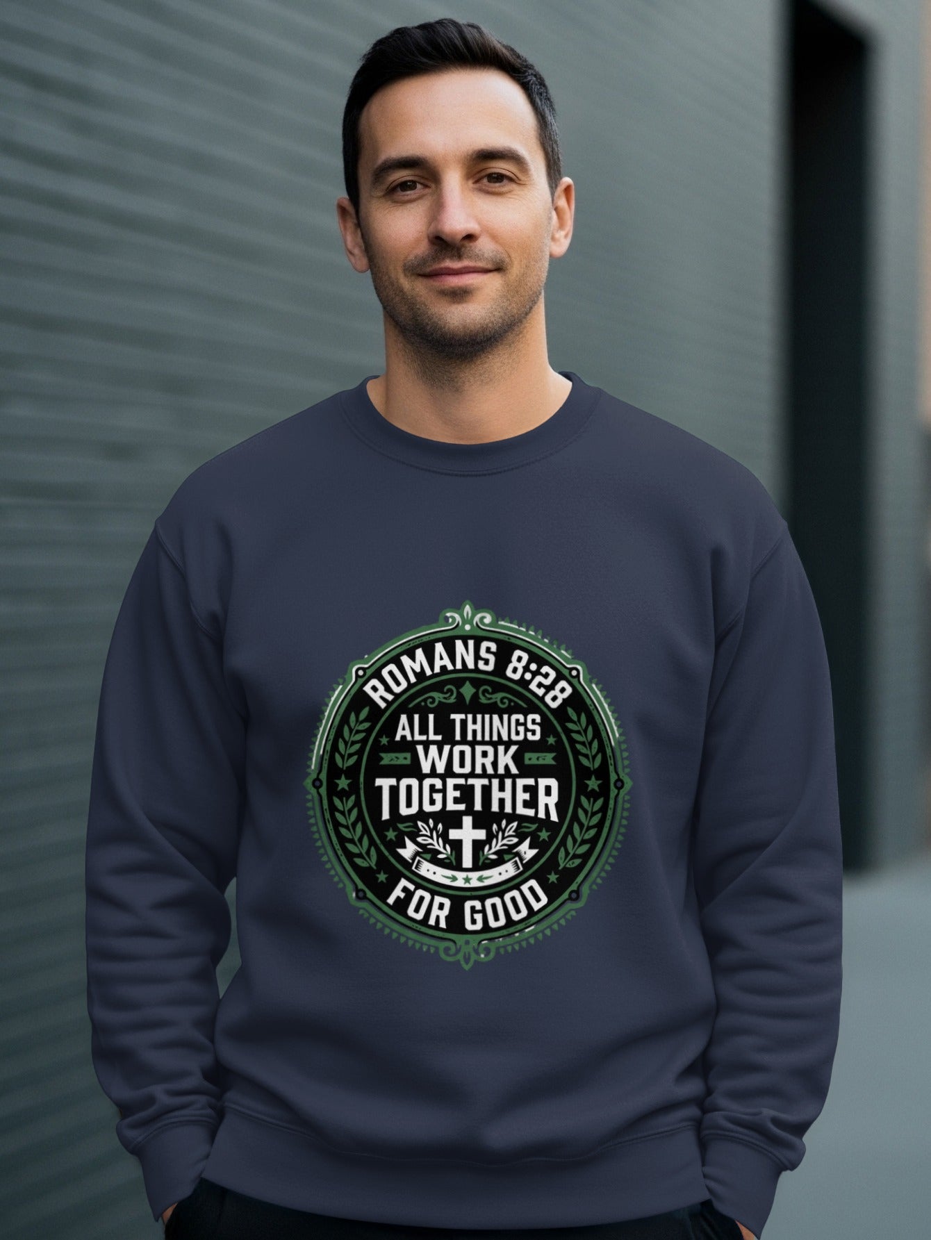 Navy sweatshirt with "Romans 8:28 All Things Work Together For Good" text.