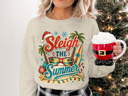 Sleigh the Summer graphic sweatshirt with Santa mug and beach scene.