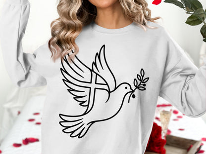 Dove with olive branch and cross graphic on white sweatshirt.