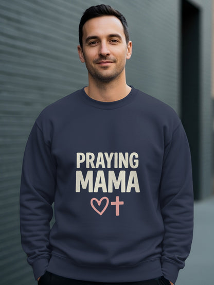 Navy sweatshirt with "Praying Mama" text and a pink heart with a cross.
