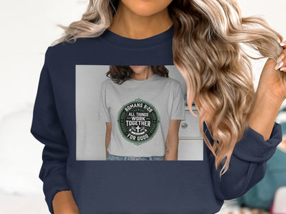 Navy sweatshirt with a grey circular graphic and "Romans 8:28 All things work together for good."