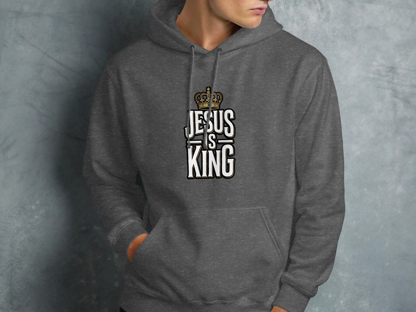 Dark grey hoodie with "Jesus is King" text and a crown graphic.