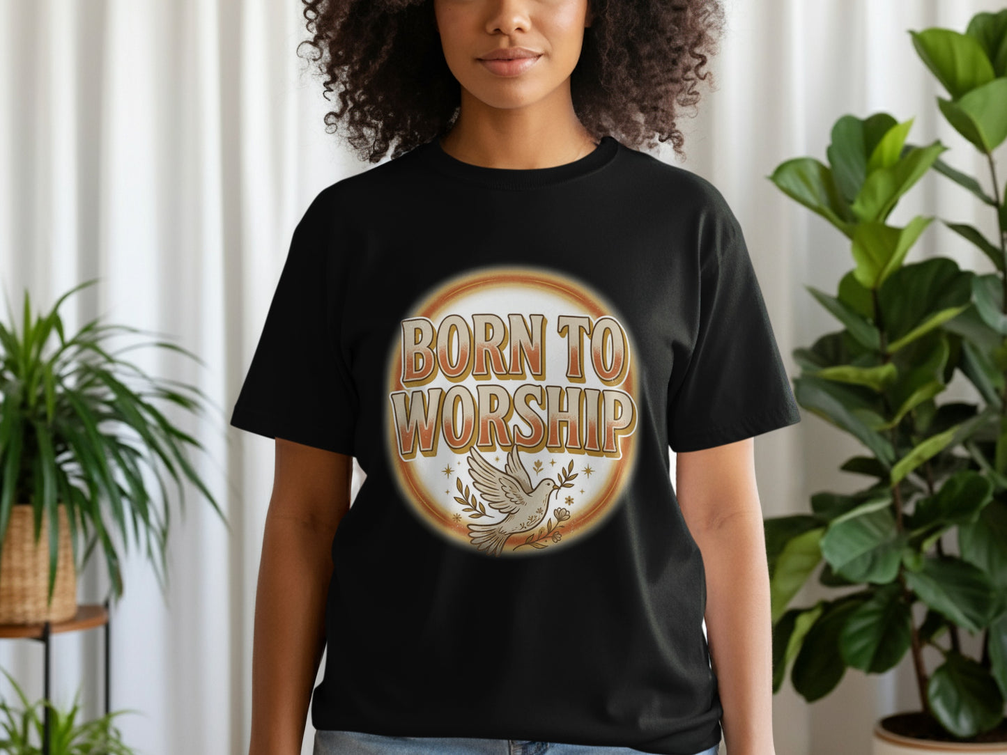 Black t-shirt with 'Born to Worship' text and a dove design.