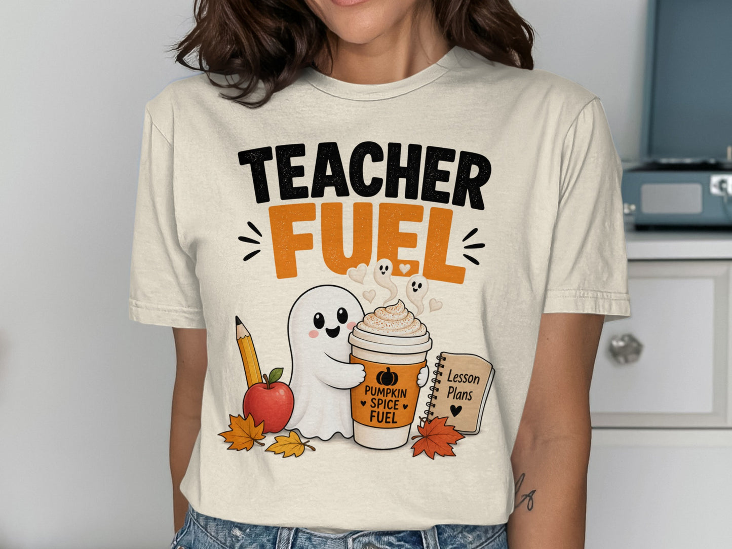 Teacher Fuel with ghost, pumpkin spice latte, apple, pencil, and lesson plans.