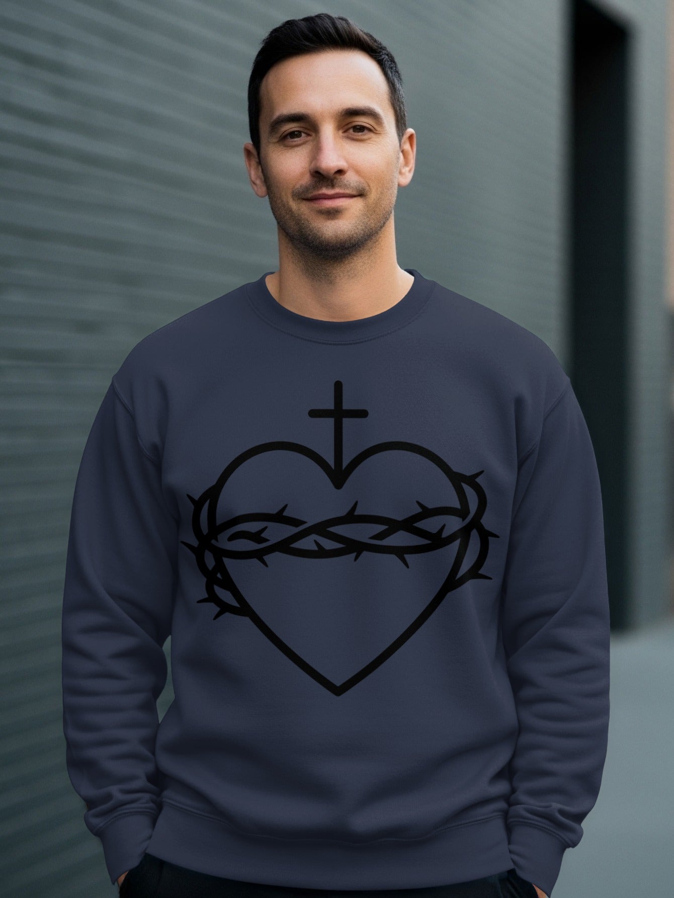 Navy crewneck sweatshirt with a black sacred heart and crown of thorns design.