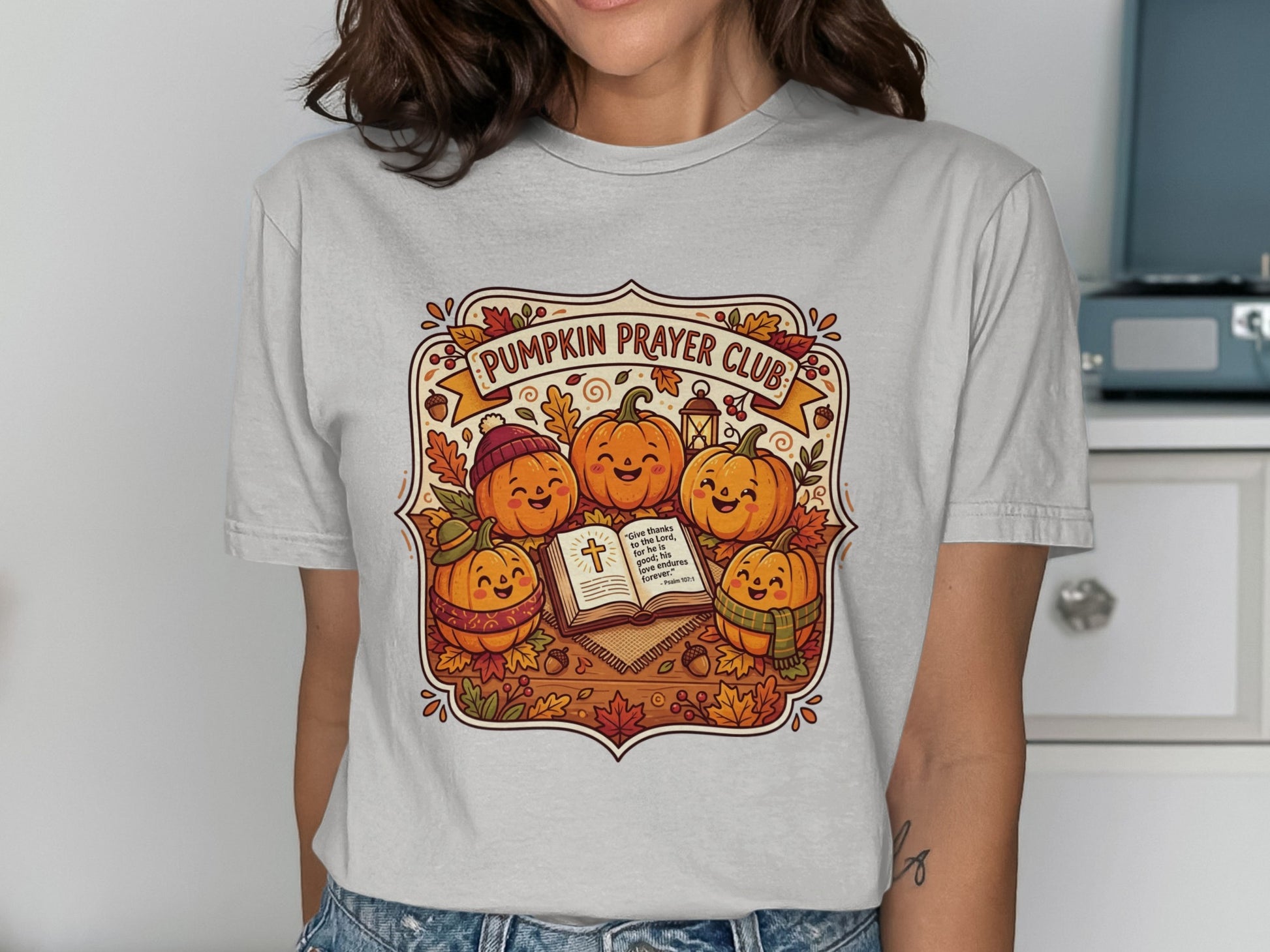 Pumpkin Prayer Club t-shirt with smiling pumpkins reading a Bible.