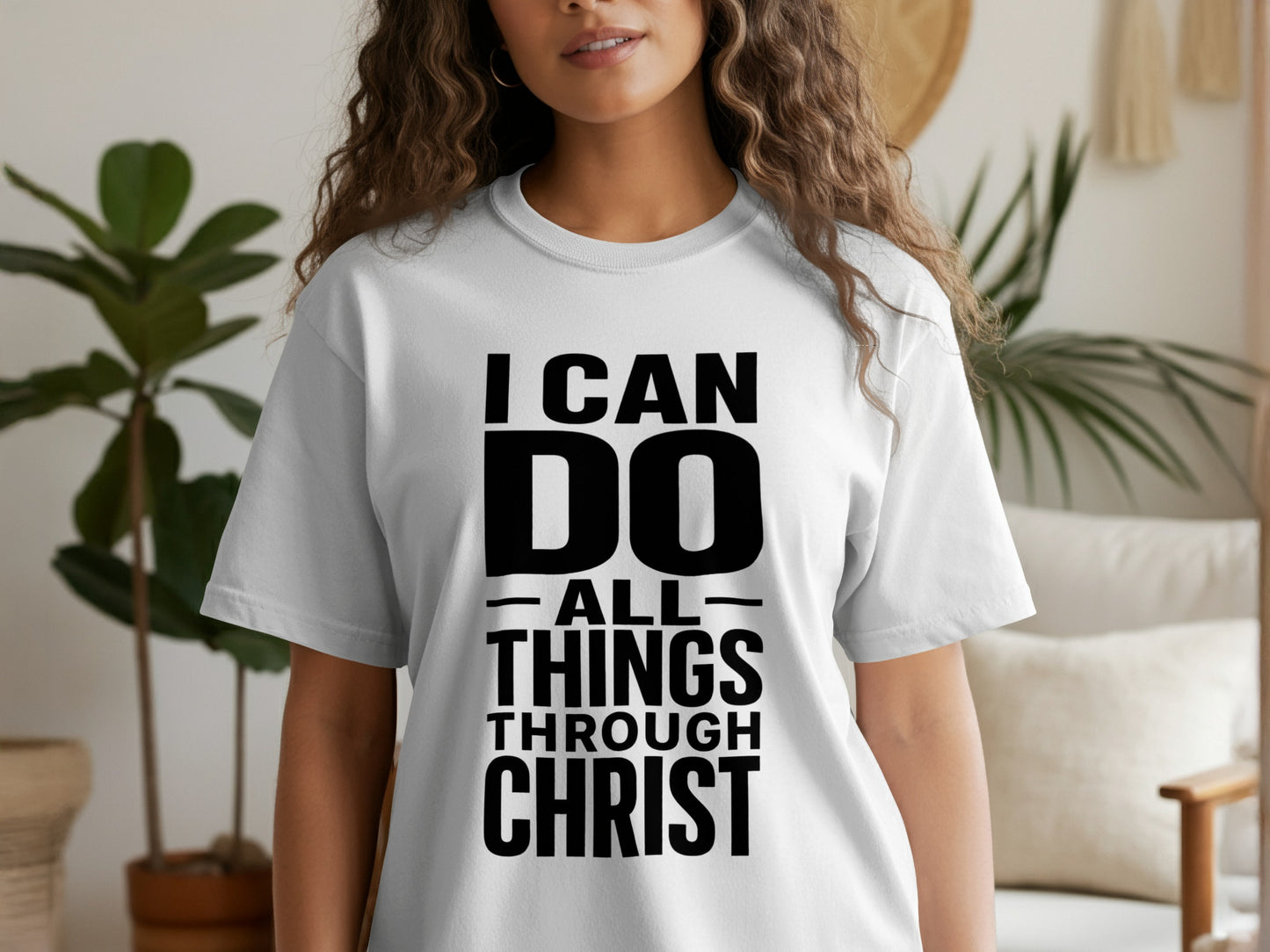 White t-shirt with black text: "I CAN DO ALL THINGS THROUGH CHRIST"