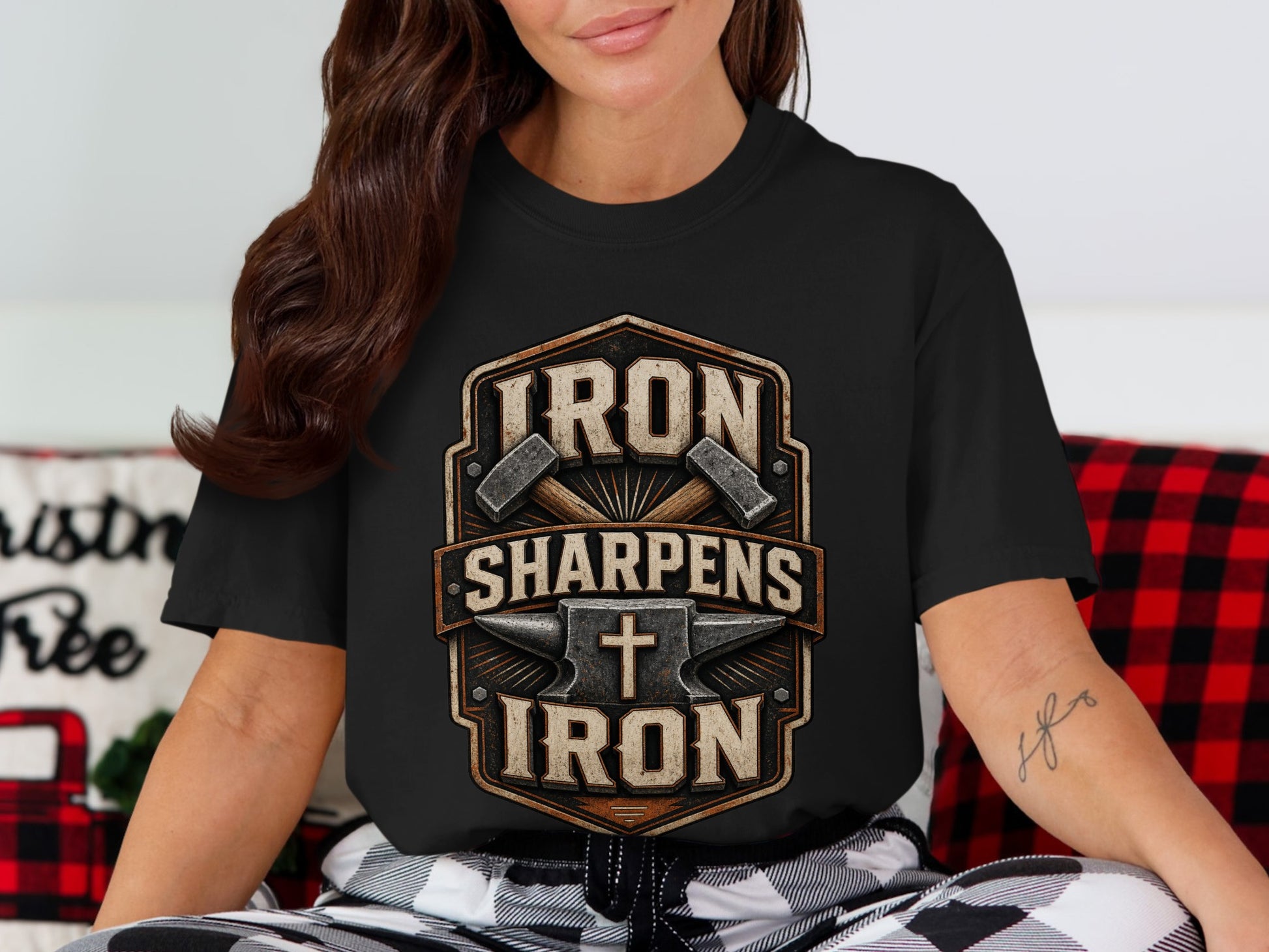 Black t-shirt with "Iron Sharpens Iron" and cross design.