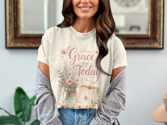 Cream t-shirt with pink floral design and "Grace for Today" text.