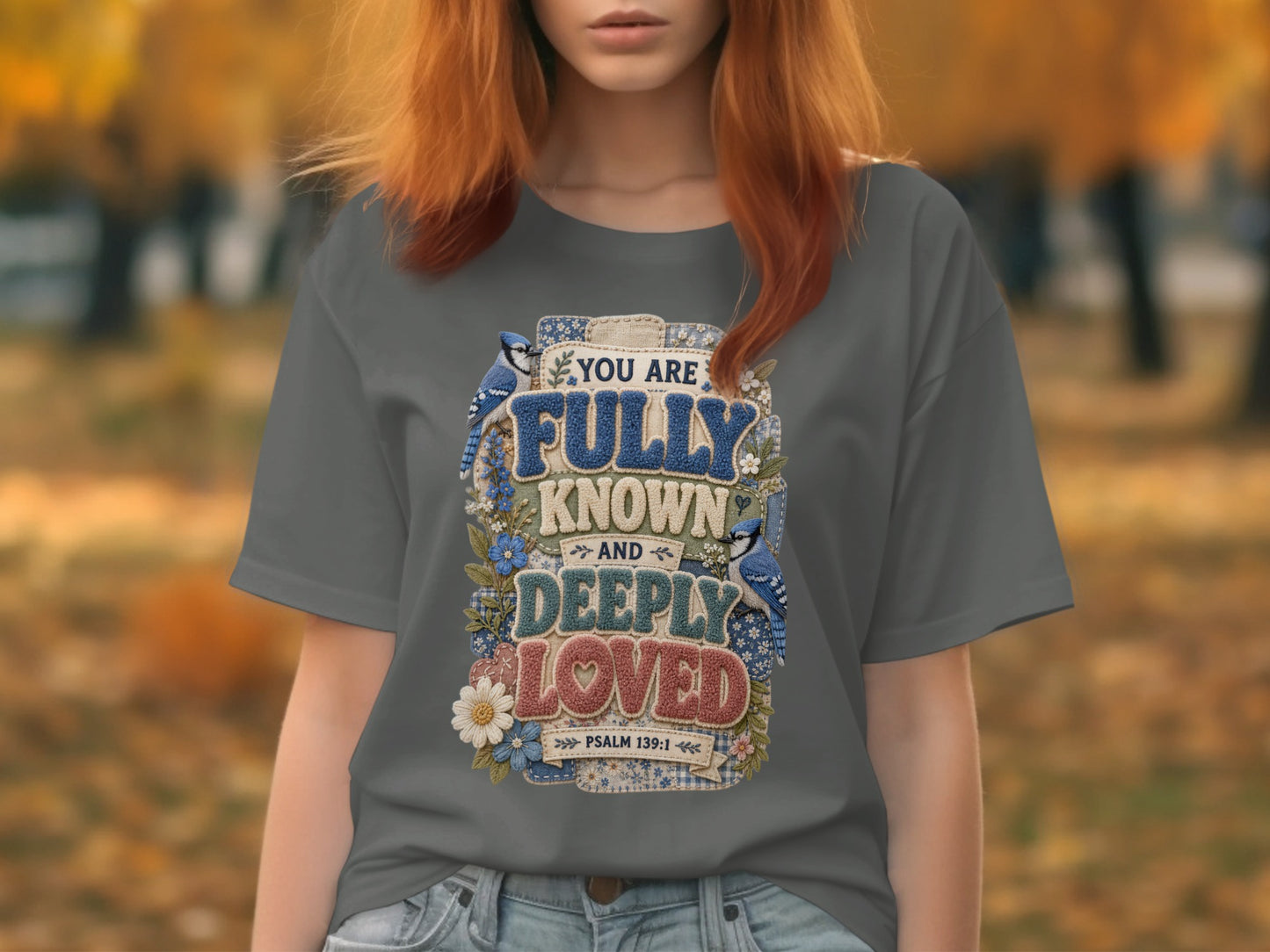Gray t-shirt with "Fully Known and Deeply Loved" Bible verse and blue birds.