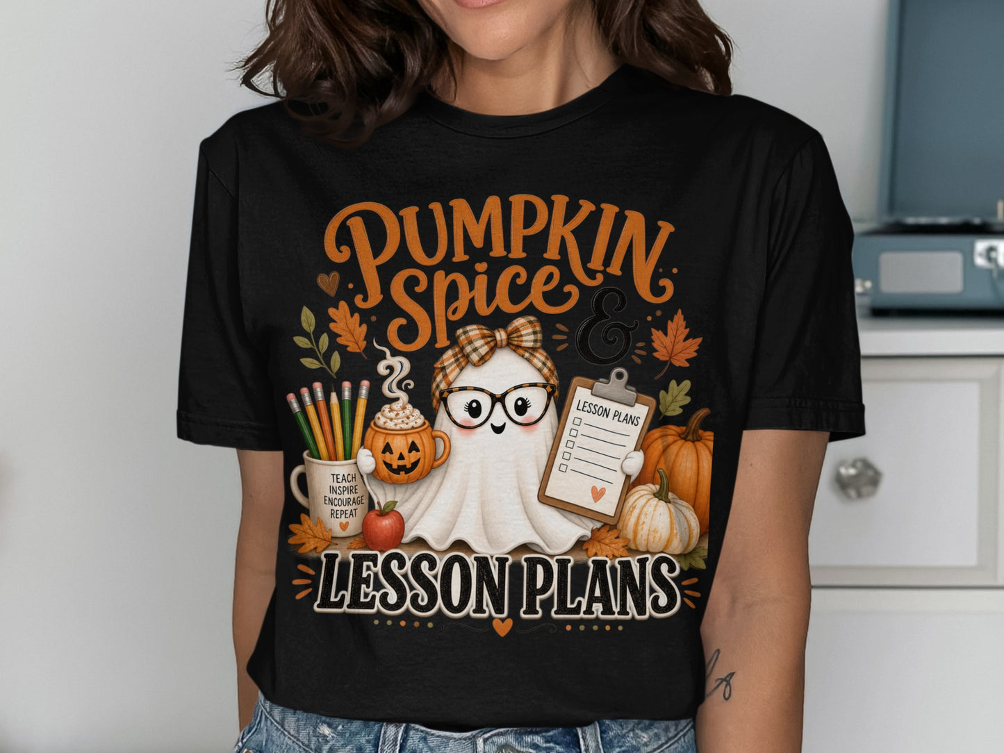 Ghost with glasses and pumpkin spice latte with text "lesson plans".
