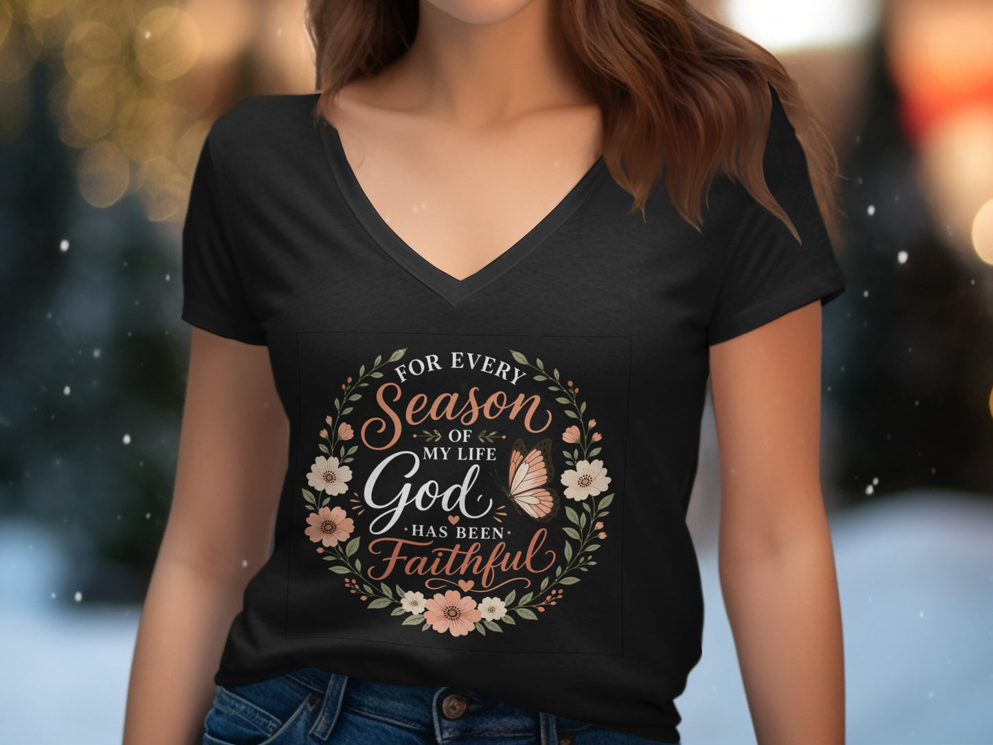 Black v-neck t-shirt with floral wreath graphic and text "For every season of my life God has been faithful".