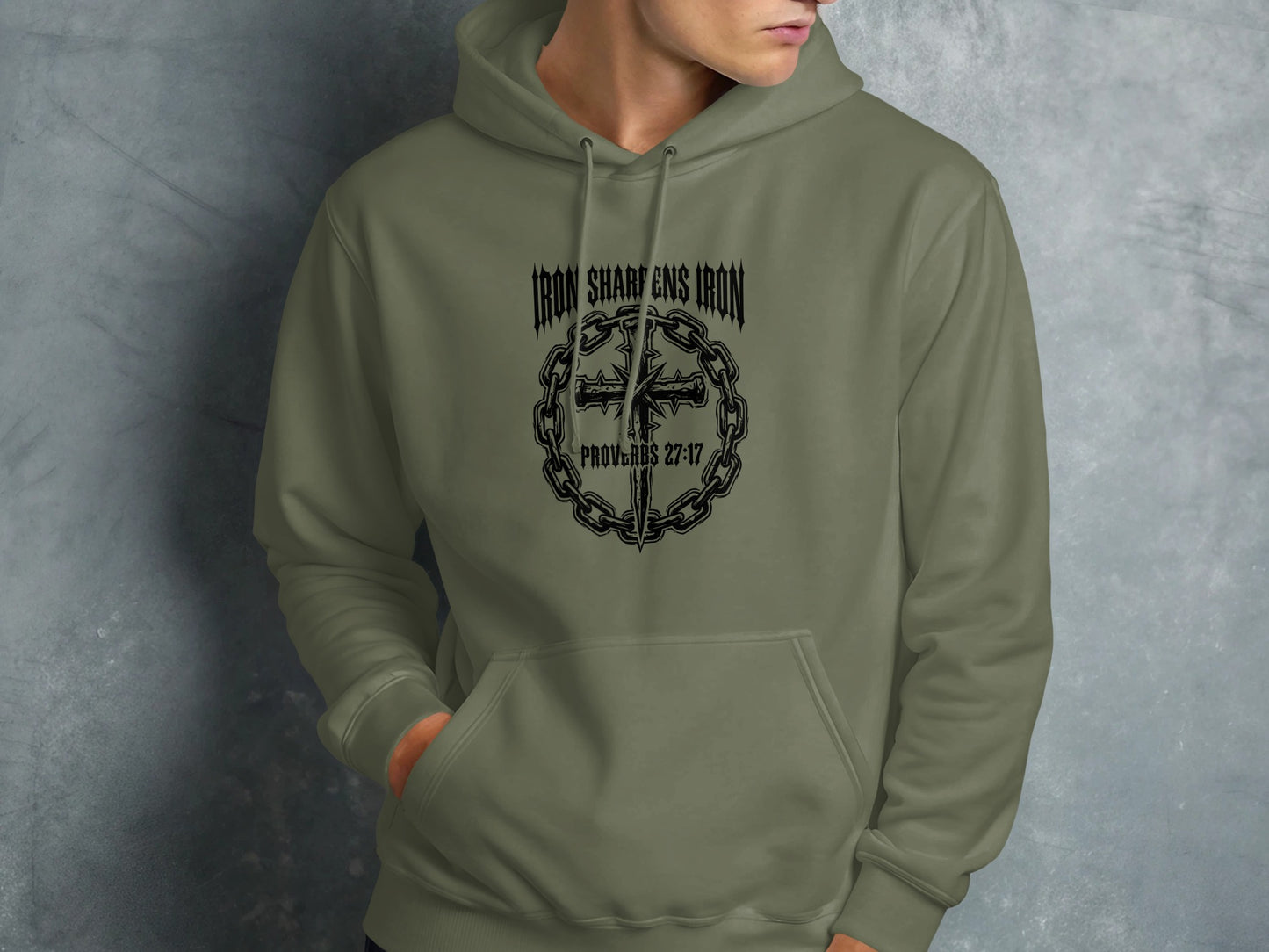 Olive green hoodie with "Iron Sharpens Iron" and cross with chains design.