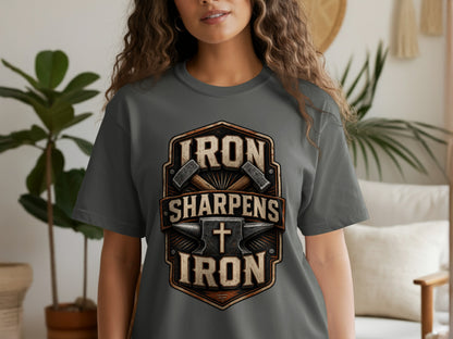 Dark grey t-shirt with graphic "IRON SHARPENS IRON" over an anvil and crosses.