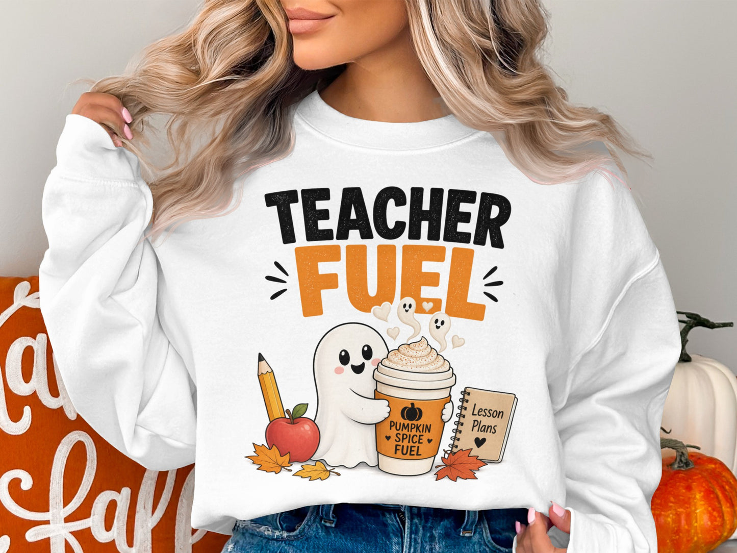 White sweatshirt with "Teacher Fuel" graphic, cute ghost, coffee, apple, and lesson plans.