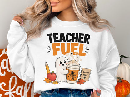 White sweatshirt with "Teacher Fuel" graphic, cute ghost, coffee, apple, and lesson plans.