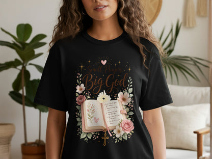 Black t-shirt with "Small Prayers, Big God" text, open book, and floral design.