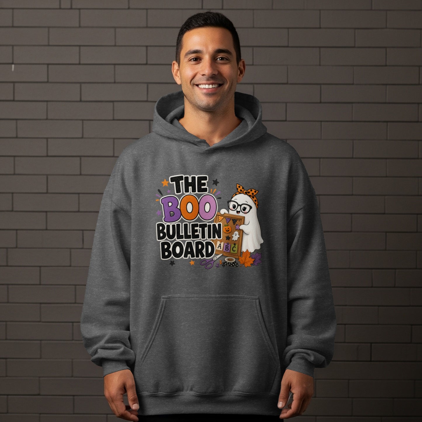 Dark grey hoodie with a Halloween-themed graphic of a ghost and "The Boo Bulletin Board" text.