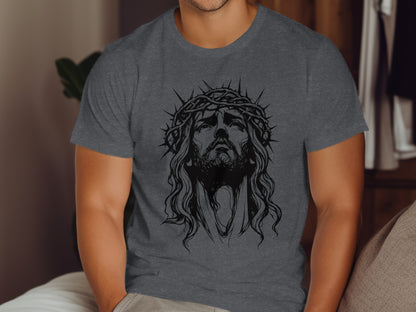 Jesus wearing a crown of thorns on a charcoal gray t-shirt.