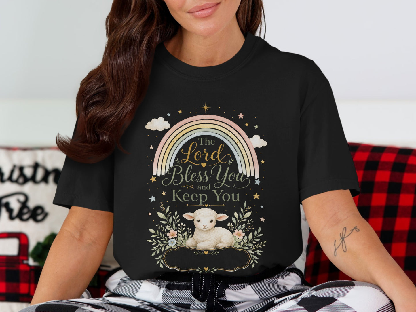 Black t-shirt with rainbow, text, and lamb graphic, The Lord Bless You and Keep You.