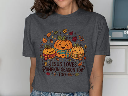 Three smiling pumpkins with scarves and fall leaves, "Jesus loves pumpkin season too" text.
