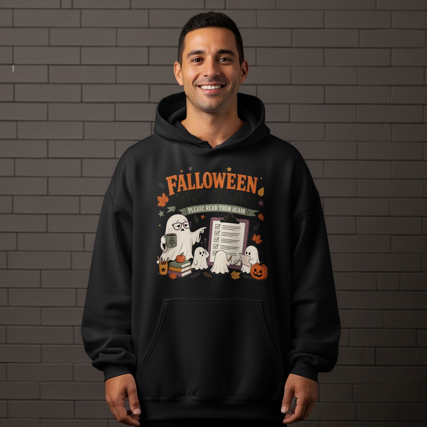 Black hoodie with a Halloween-themed graphic of ghosts and text "Falloween Please Read Them Again".