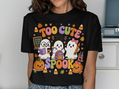Three cute ghosts, pumpkins, and candy corn with text "Too cute to spook."