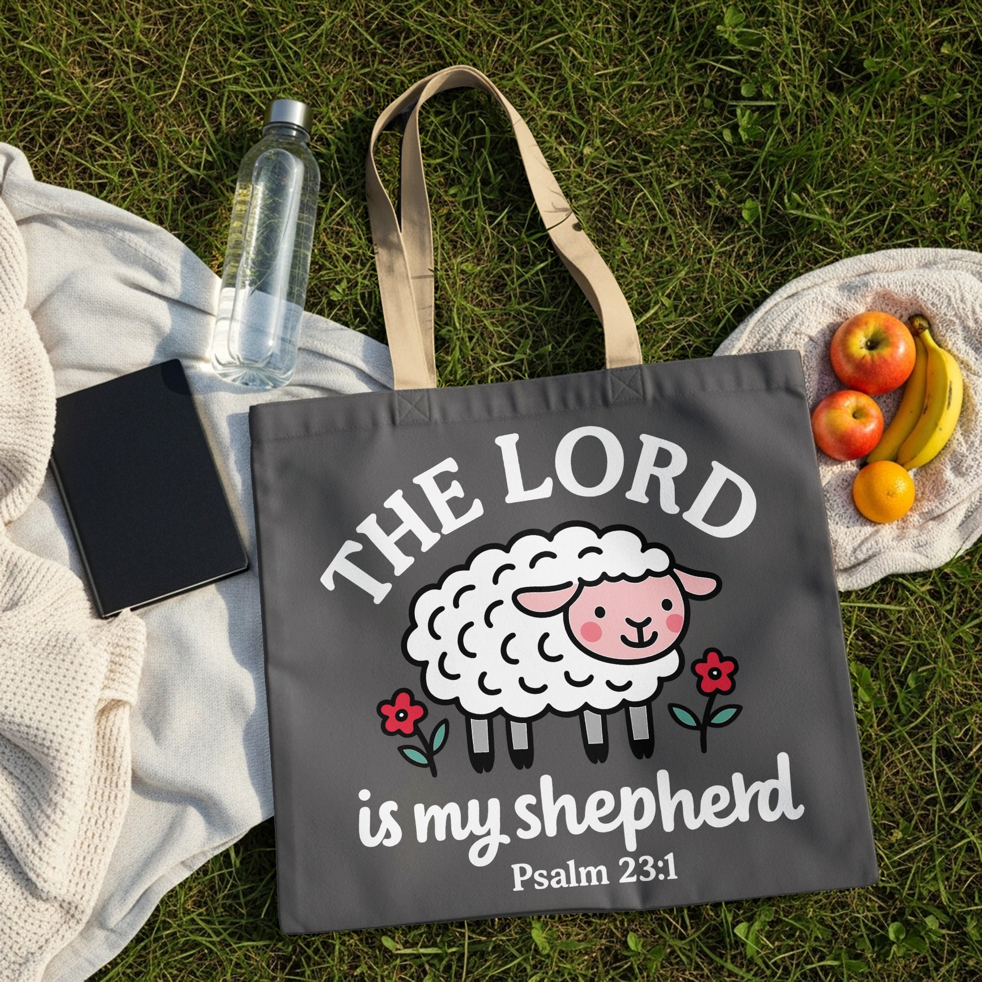 Dark gray tote bag with cartoon sheep, "The Lord is my shepherd," and Psalm 23:1.