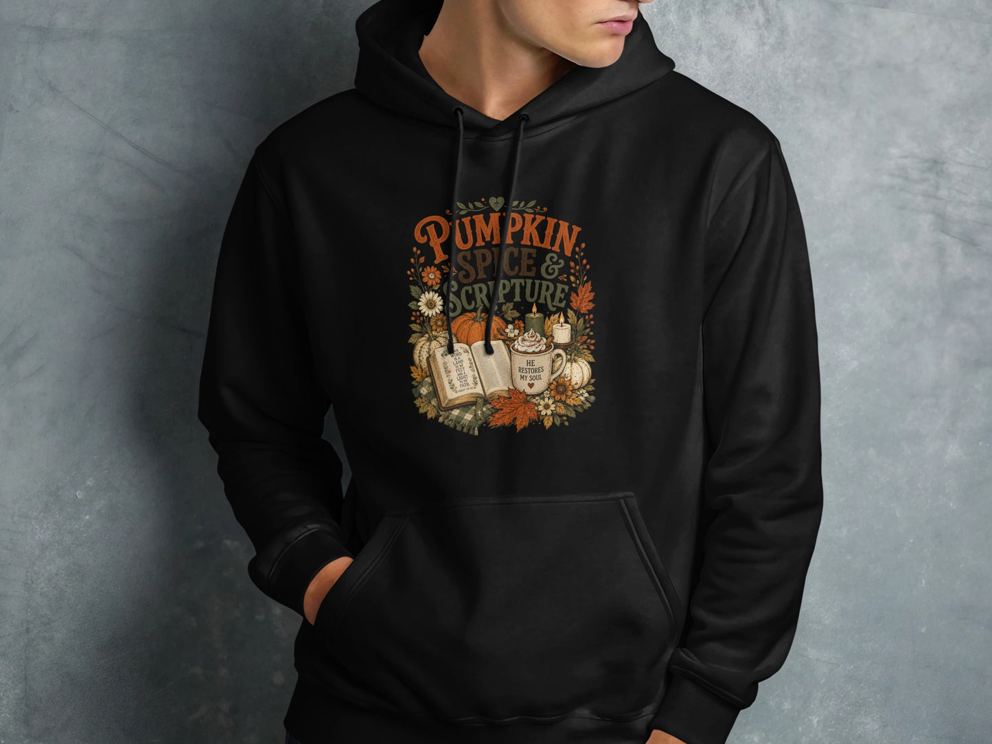 Black hoodie with "Pumpkin Spice & Scripture" text and fall illustrations.