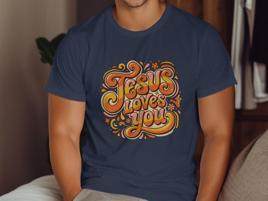 Navy t-shirt with "Jesus Loves You" in retro, colorful, groovy lettering.