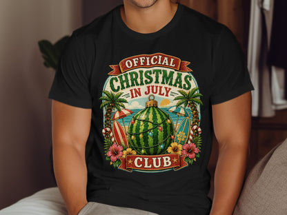 T-shirt with "Official Christmas in July Club" text, watermelon, palm trees, and beach imagery.