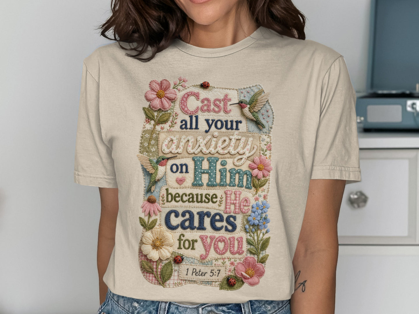 T-shirt with "Cast all your anxiety on Him because He cares for you" and Bible verse.