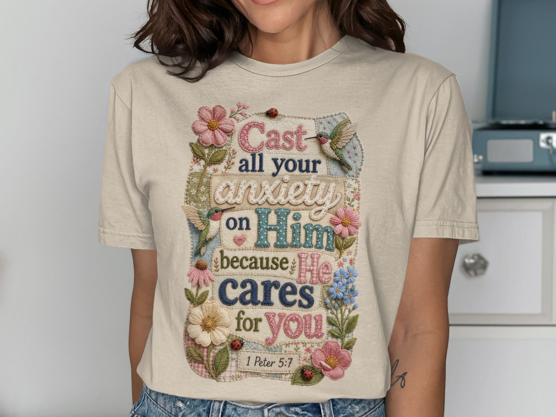 T-shirt with "Cast all your anxiety on Him because He cares for you" and Bible verse.