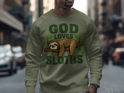 Green sweatshirt with "GOD LOVES SLOTHS" text and a sloth illustration.