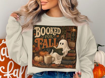 Ghost reading a book on books with pumpkins and coffee, "Booked for Fall" graphic.