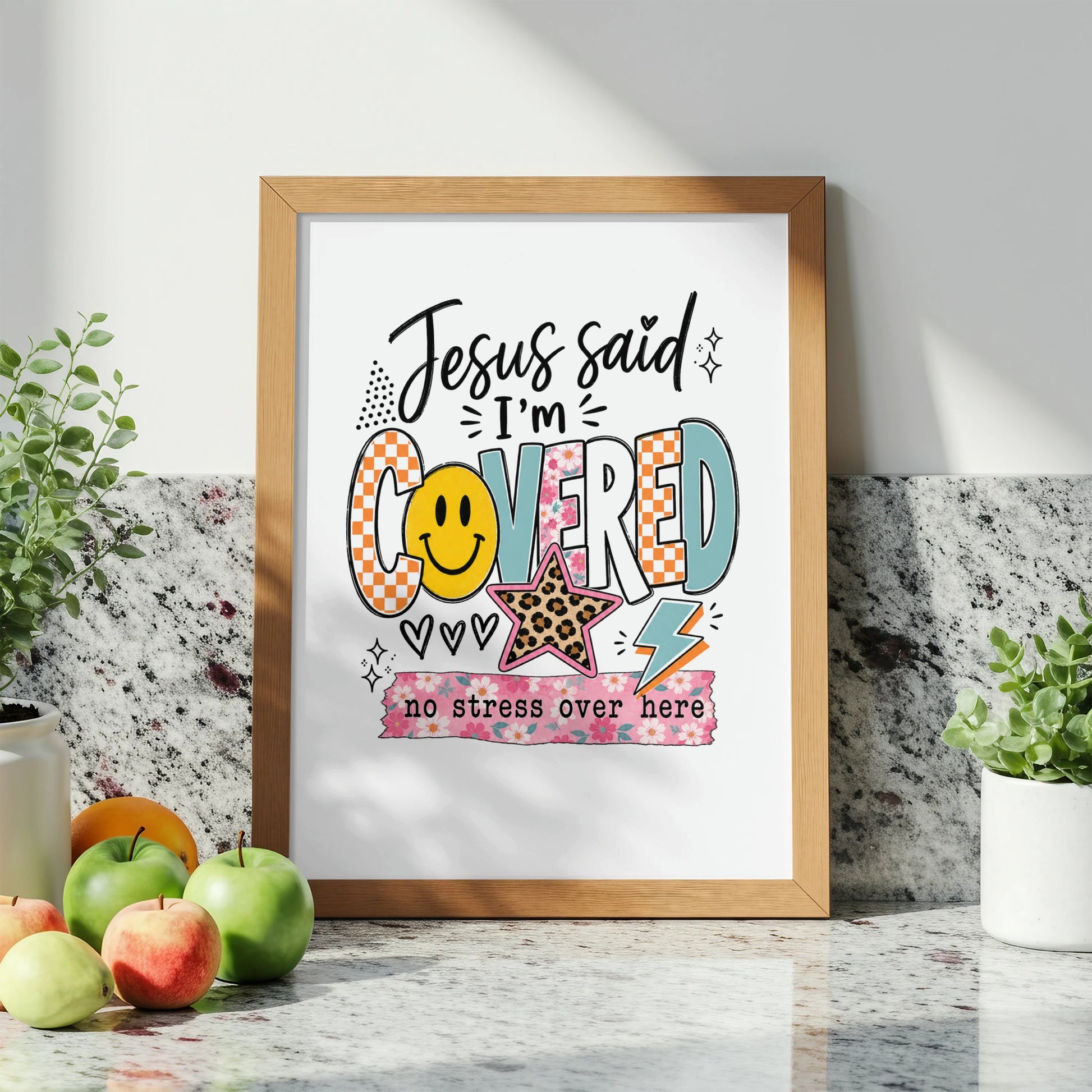 Jesus said I'm covered, no stress over here graphic with smiley face and star.