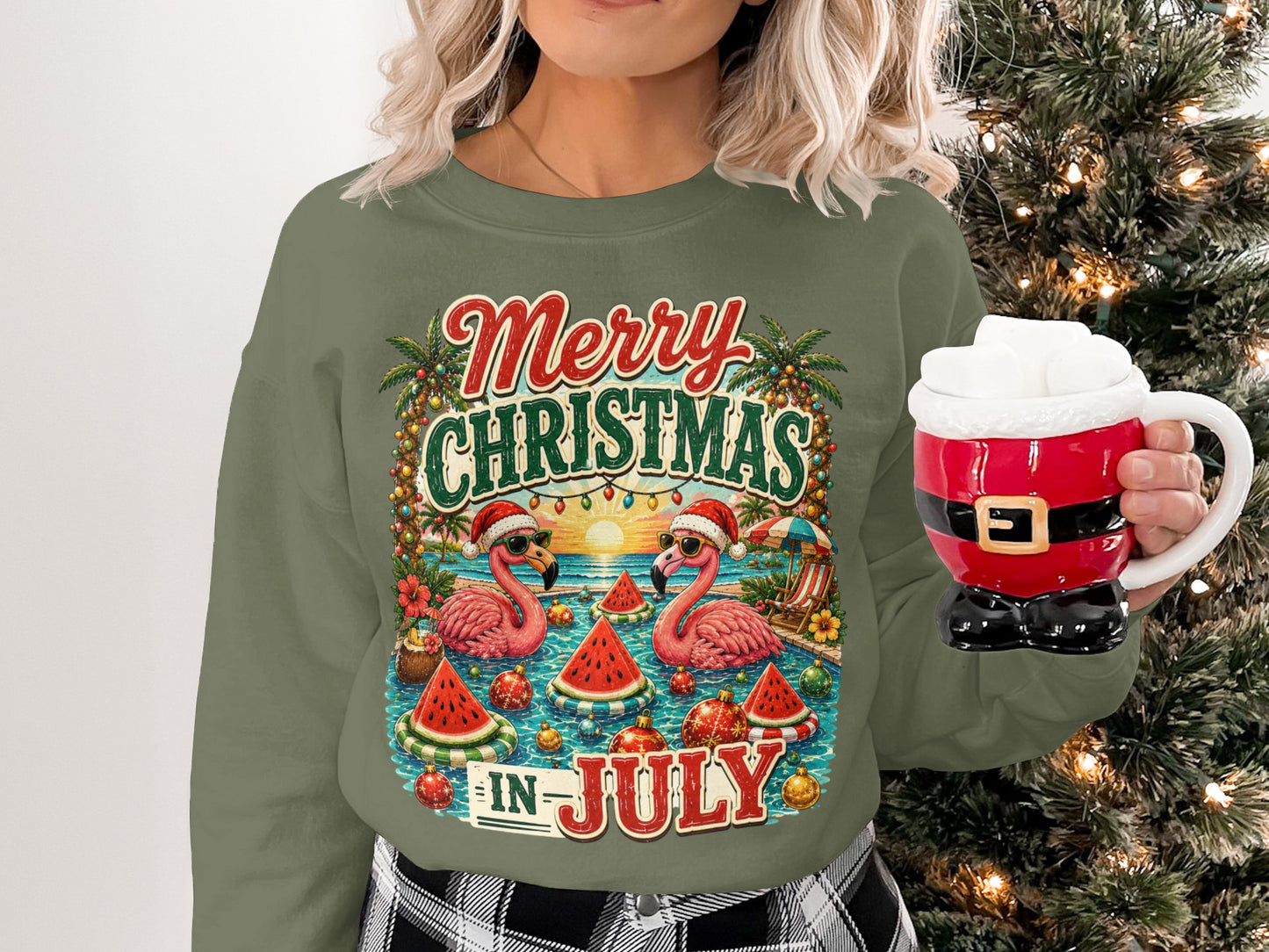 Crewneck sweatshirt with flamingos, watermelons, and "Merry Christmas in July" text.