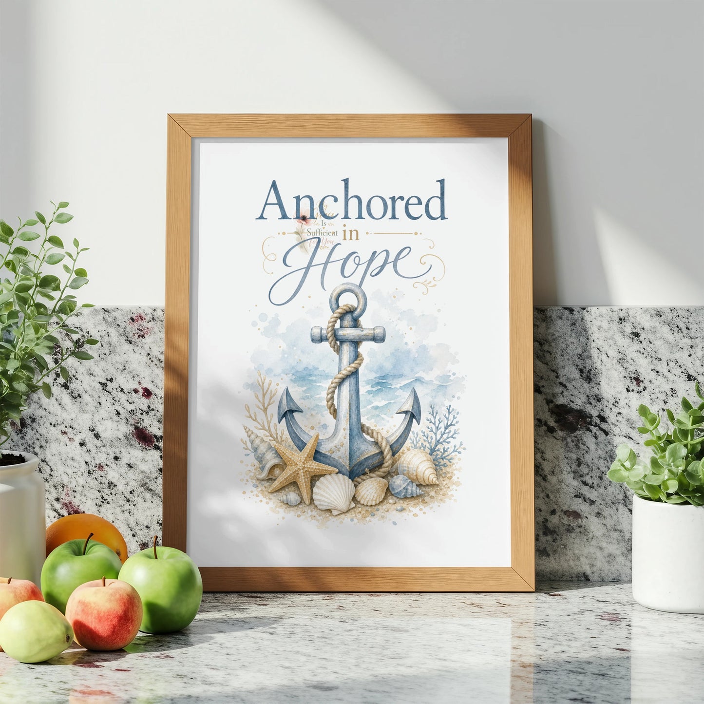 Framed art print with an anchor, seashells, and the text "Anchored in Hope".