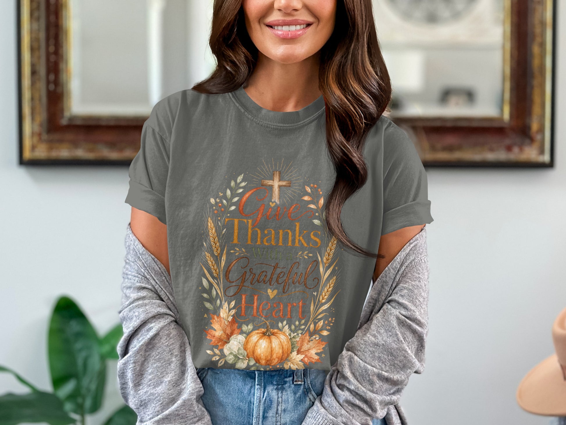 Grey t-shirt with "Give Thanks With a Grateful Heart" text, cross, pumpkin, and autumn leaves.
