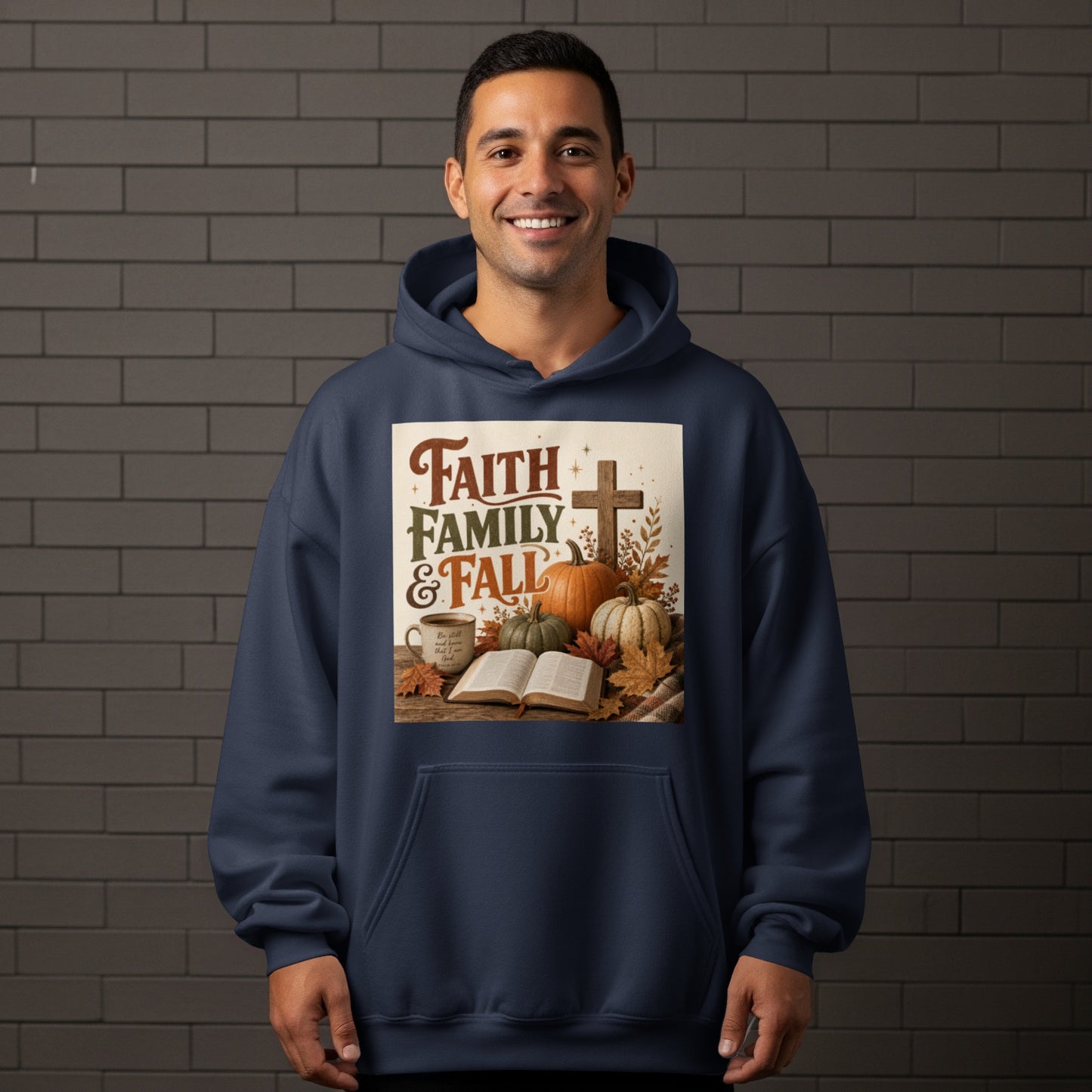 Navy hoodie with a graphic featuring "Faith Family & Fall" text, pumpkins, and a cross.