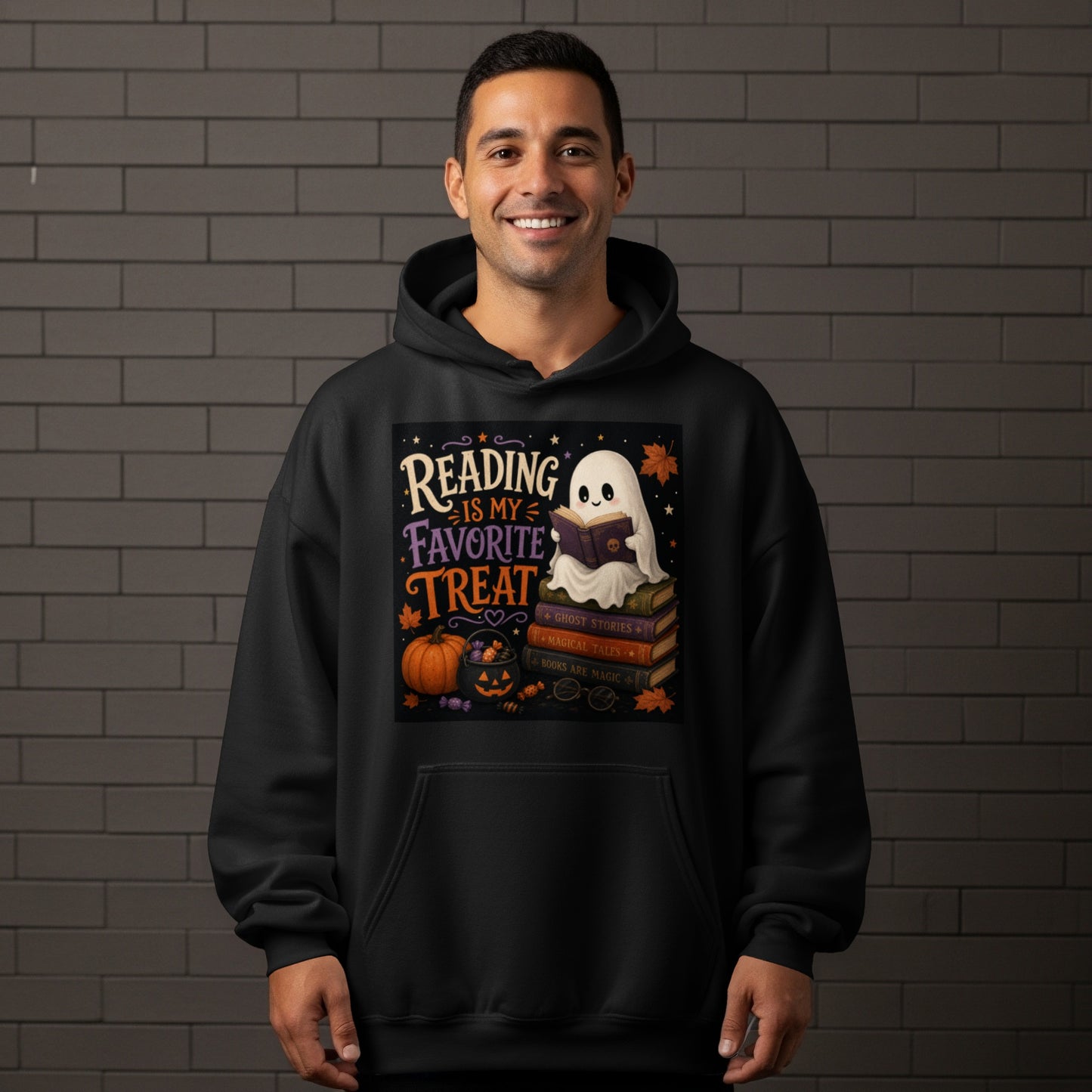 Black hoodie with Halloween graphic: ghost reading on books, pumpkin, candy, and text.