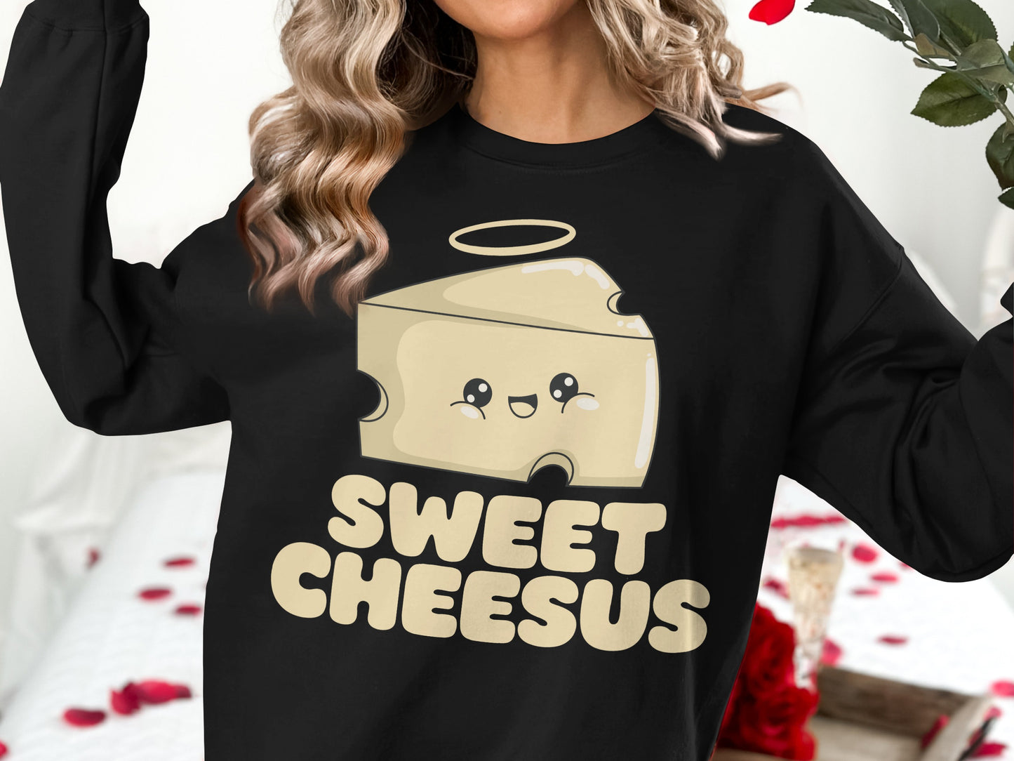 Black sweatshirt with "Sweet Cheesus" text and a smiling cheese character with a halo.