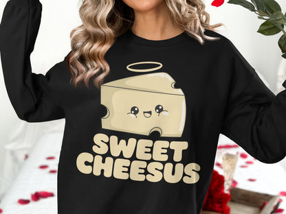 Black sweatshirt with "Sweet Cheesus" text and a smiling cheese character with a halo.